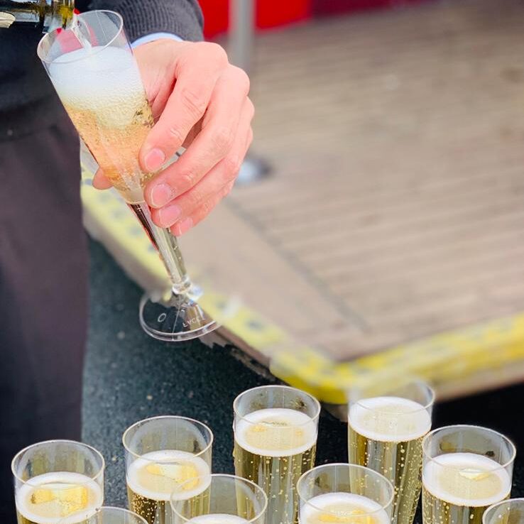 Champagne serving outside Routemaster
